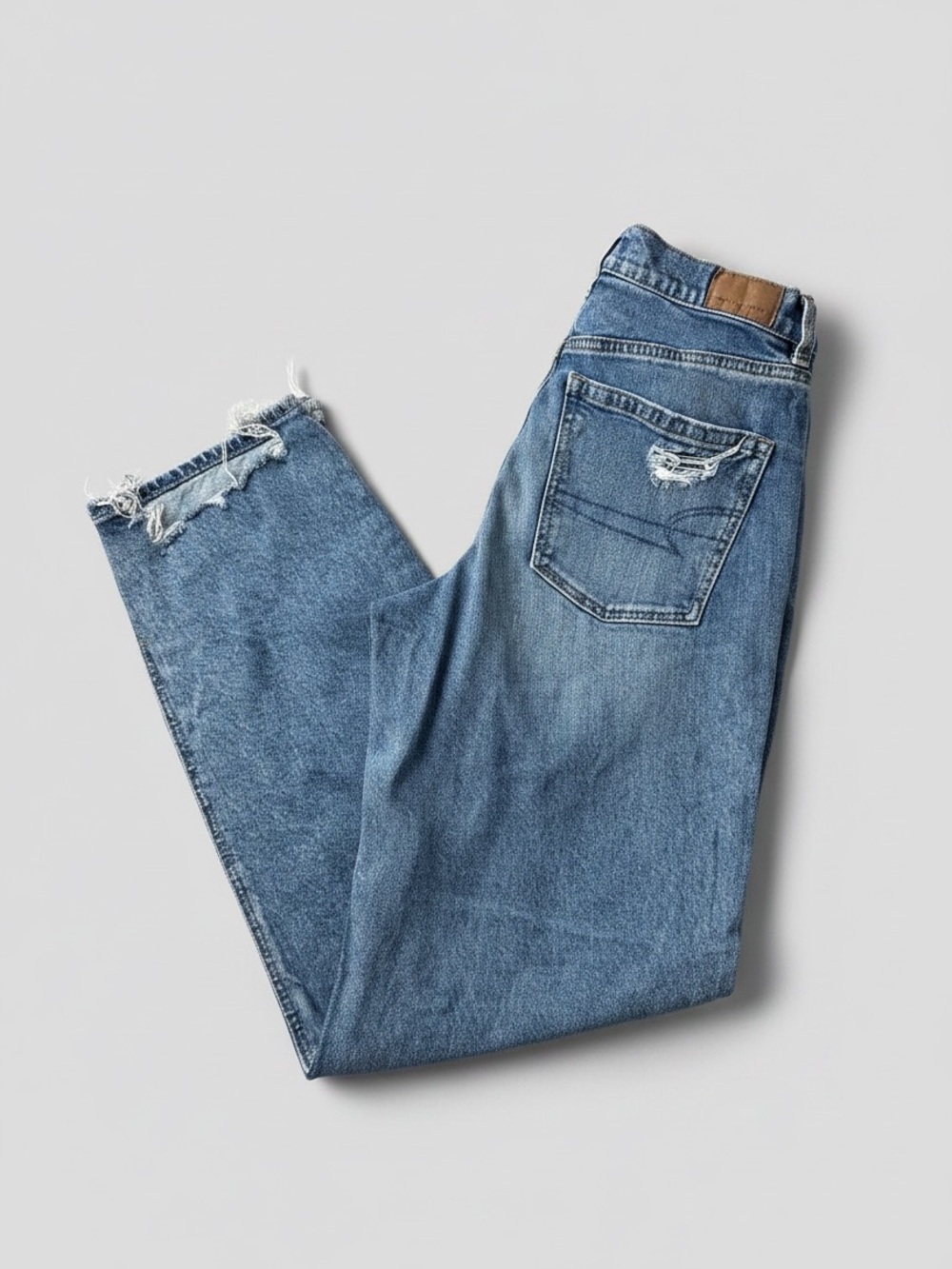 American Eagle Outfitters Light Blue Strigid Jeans with Ripped Knees